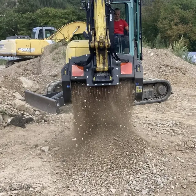 Every load of dirt you truck off site to get screened is a load you're paying to haul twice, once out and once back in as clean material. 

The Screening Bucket does that sorting on the spot, separating rock and debris from usable fill right where you're digging instead of sending it on a round trip to a yard. 

Dial the screen size up or down for how fine you need it, and it bolts onto anything from a 2.5 ton machine up through a 22 ton excavator.